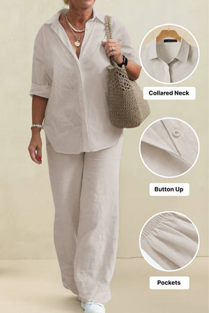 woman wearing oversized 100% cotton shirt with collared neck and button-up detail paired with wide-leg pants in neutral tone