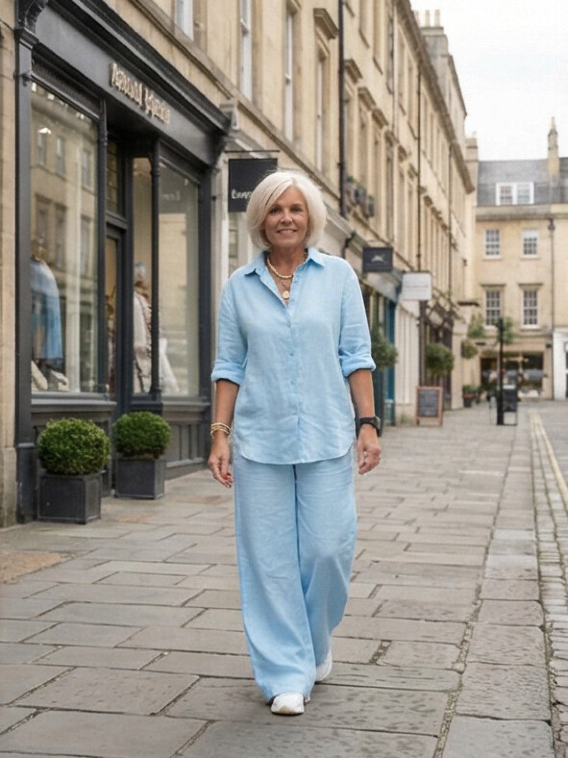 Model wearing oversized 100% cotton shirt with wide-leg pants co-ord set in a relaxed fit