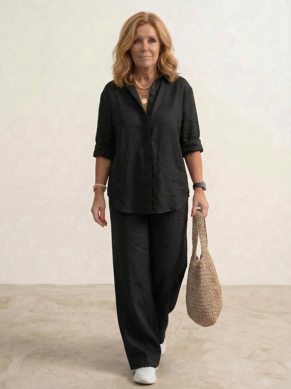 Woman wearing oversized 100% cotton shirt and wide-leg pants co-ord set in a relaxed, breathable fit