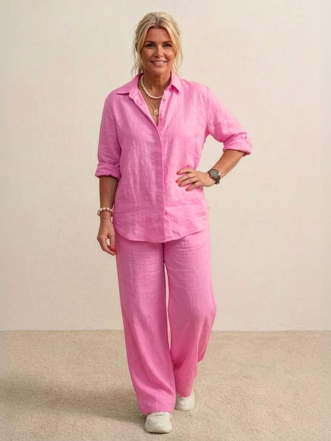 woman wearing oversized 100 cotton shirt and wide-leg pants co-ord set in pink