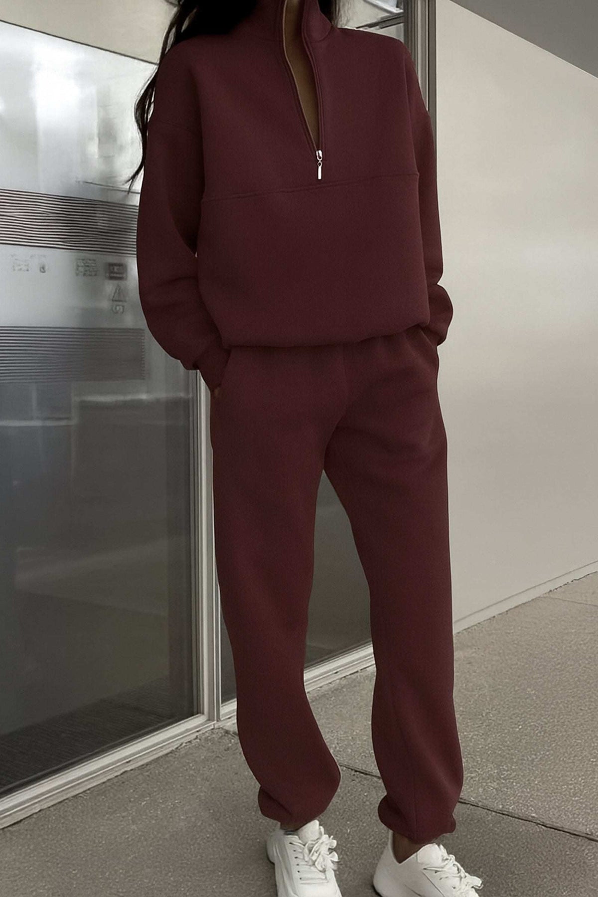 Minimalist maroon cotton blend tracksuit with zip neckline and relaxed fit