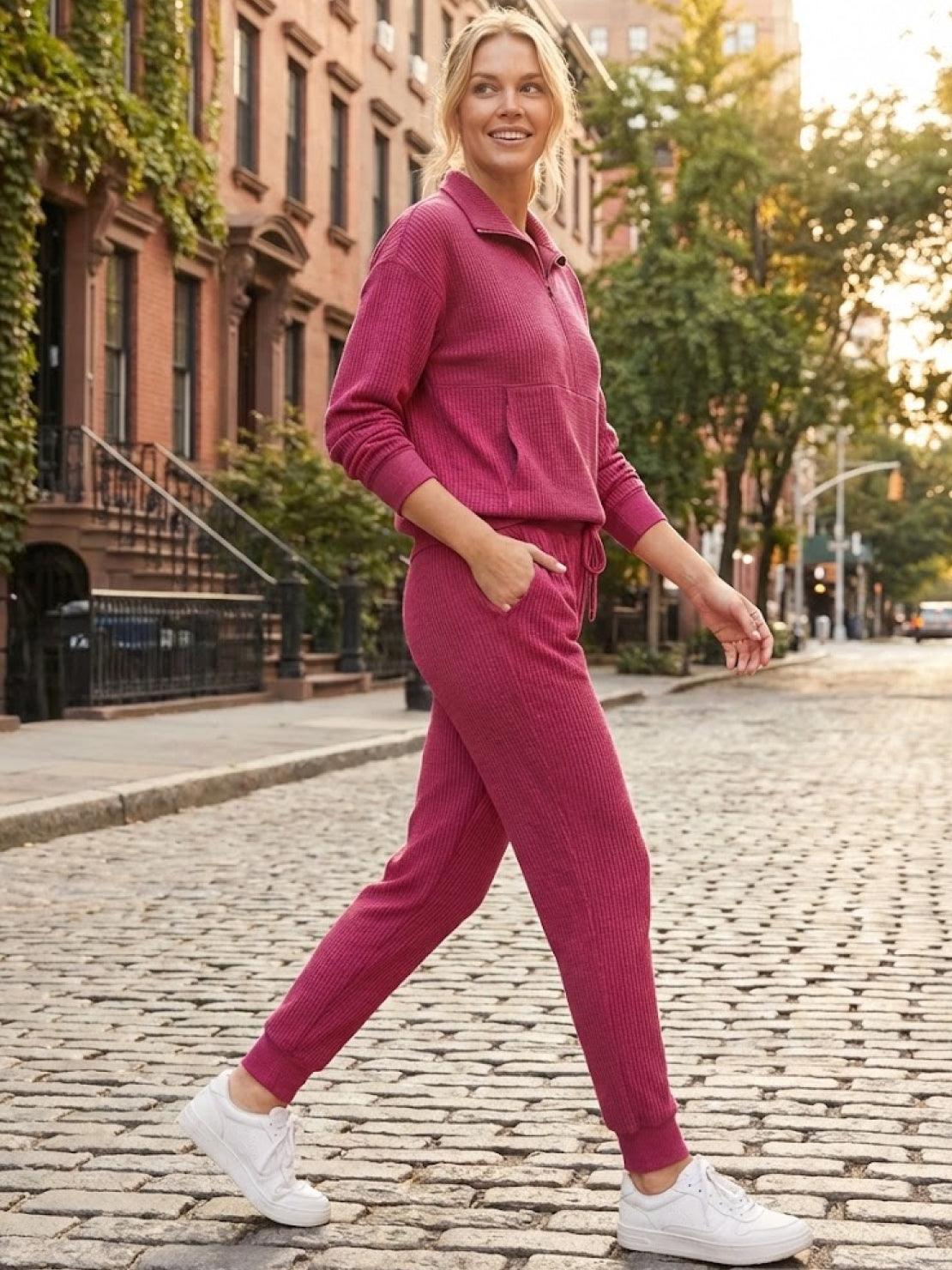 Unisex half-zip pullover and matching sweatpants set for casual comfort and travel