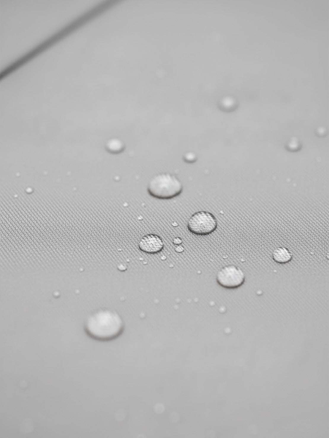 Water-repellent rain A-line hooded women's raincoat with insulated lining and matching belt