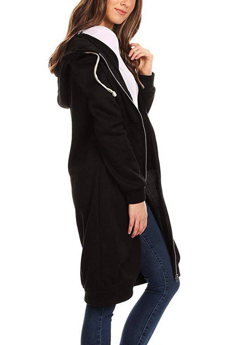 Black oversized long zip sweatshirt hoodie with drawstring hood and fleece lining worn by woman
