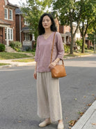 100% cotton linen blend golden hour set with embroidered V-neck top and high-waisted wide-leg trousers