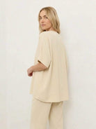 Cotton-blend capelet lounge set with mock neck top and wide-leg pants in smooth fabric