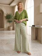 Black striped wide-leg co-ord set with oversized top and palazzo pants with elastic waist and side pockets