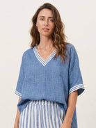 Black striped wide-leg co-ord set with oversized top and palazzo pants