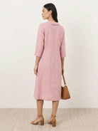 linen-look midi dress with relaxed A-line silhouette, blazer neckline, and side pockets