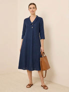 linen-look midi dress with relaxed A-line silhouette and side pockets in blue polyester fabric