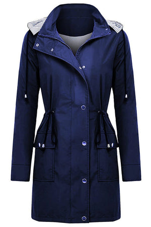 Navy blue water resistant windbreaker jacket with hood and striped inner lining for women