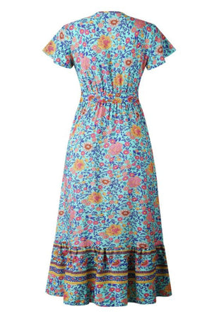 Bohemian floral print wrap dress with ruffle skirt and high waist in bright multicolor cotton fabric