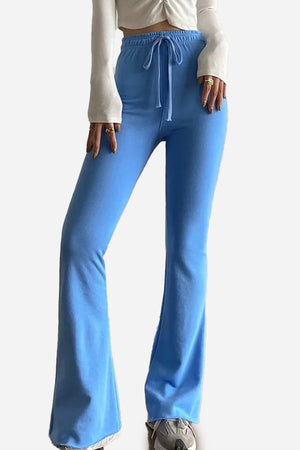 Blue comfy wide-leg pants with elastic waistband and drawstring, flared style for casual wear
