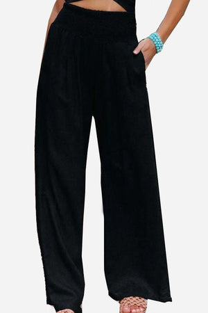 Black high-waist palazzo pants with wide legs and side pockets made from breathable cotton linen blend