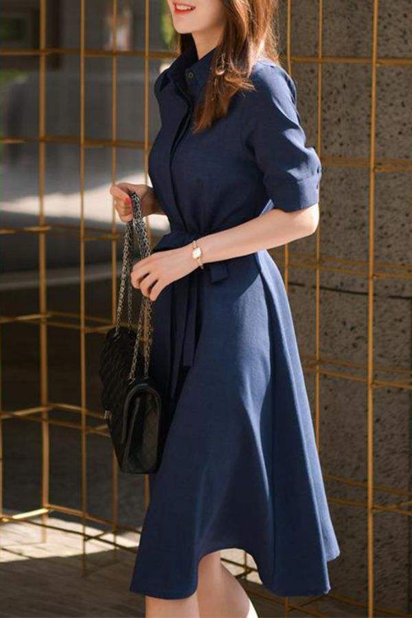 Navy Radiance Belted Shirt Dress in lightweight polyester with a classic collar and detachable belt for a flattering silhouette.
