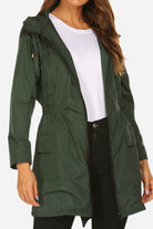 Outdoor and Travel Hooded Raincoat windbreaker jacket in dark green polyester, lightweight and weather resistant.