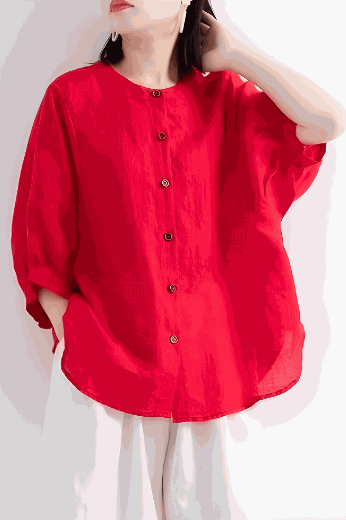 Red relaxed loose breathable linen blouse with button-down front and three-quarter sleeves