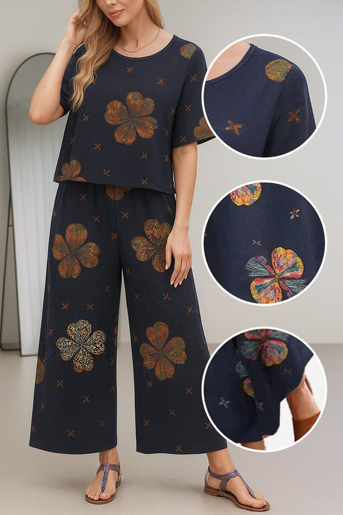 Loose Fit Co-ord Set featuring wide-leg pants and short-sleeve top with floral prints in breathable cotton-linen blend.