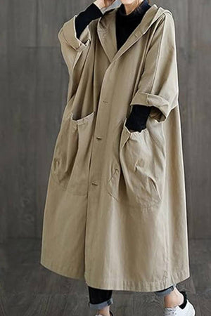 oversized beige water resistant windbreaker jacket with pockets and long sleeves for layering
