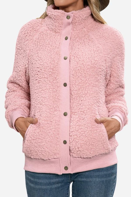 Cozy long sleeve pink sherpa jacket with button closure and fleece interior