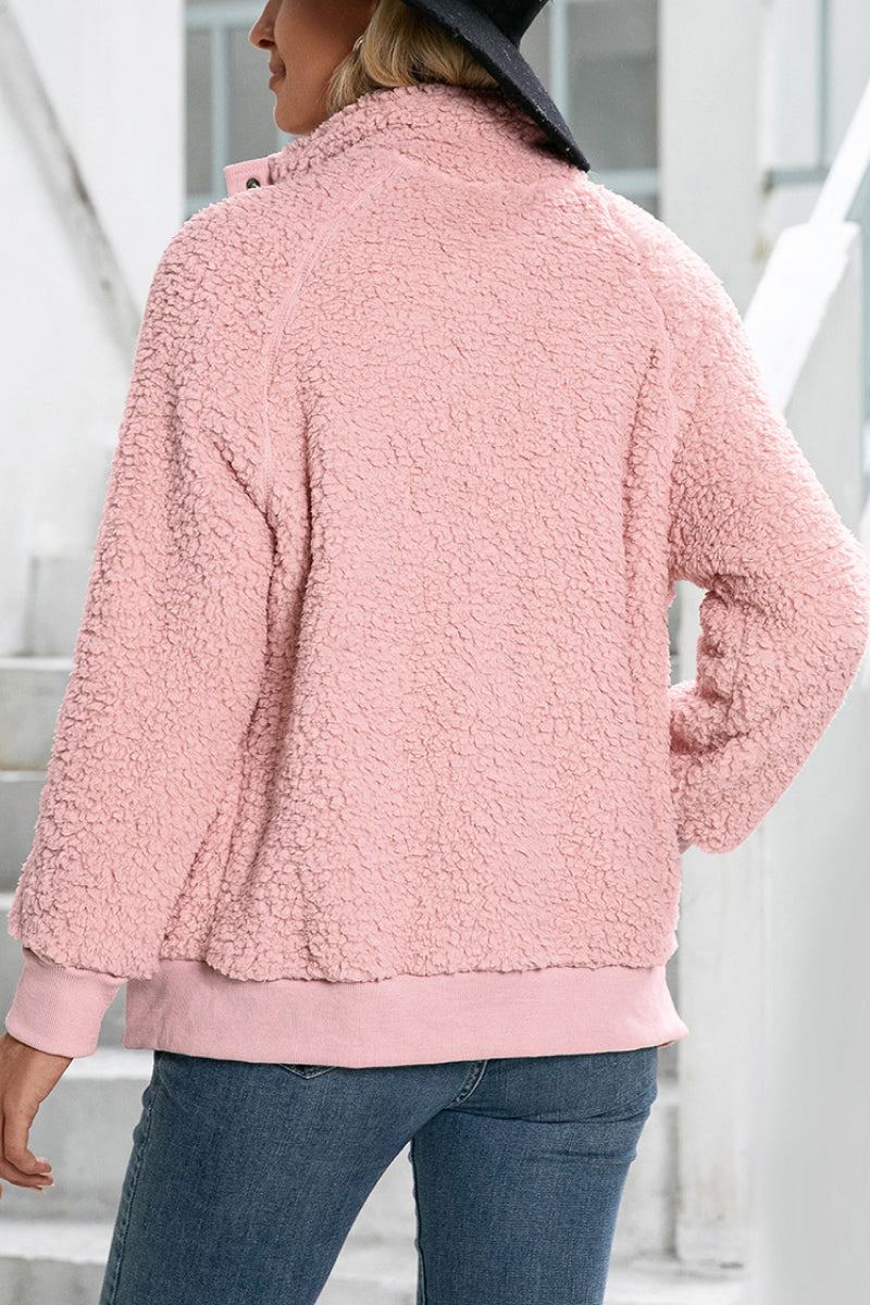Cozy long sleeve pink sherpa jacket with warm fleece interior and soft exterior, lightweight and stylish for layering.