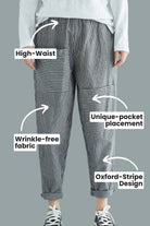 High waist striped pants with wrinkle-free fabric, unique pocket placement, and Oxford-stripe design.