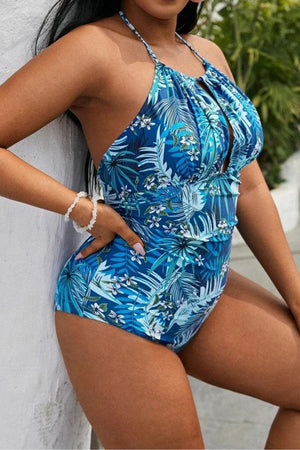 Curvy Comfort Plus Size one-piece swimsuit with blue tropical floral print and ruched bust detail