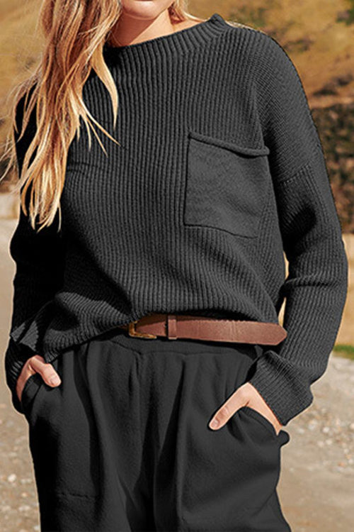 European minimalism relaxed black knit sweater with pocket and matching trousers set for casual fall style