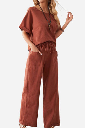 Women's rolled cuff top and patch pocket pants set in rust color, relaxed fit, breathable fabric