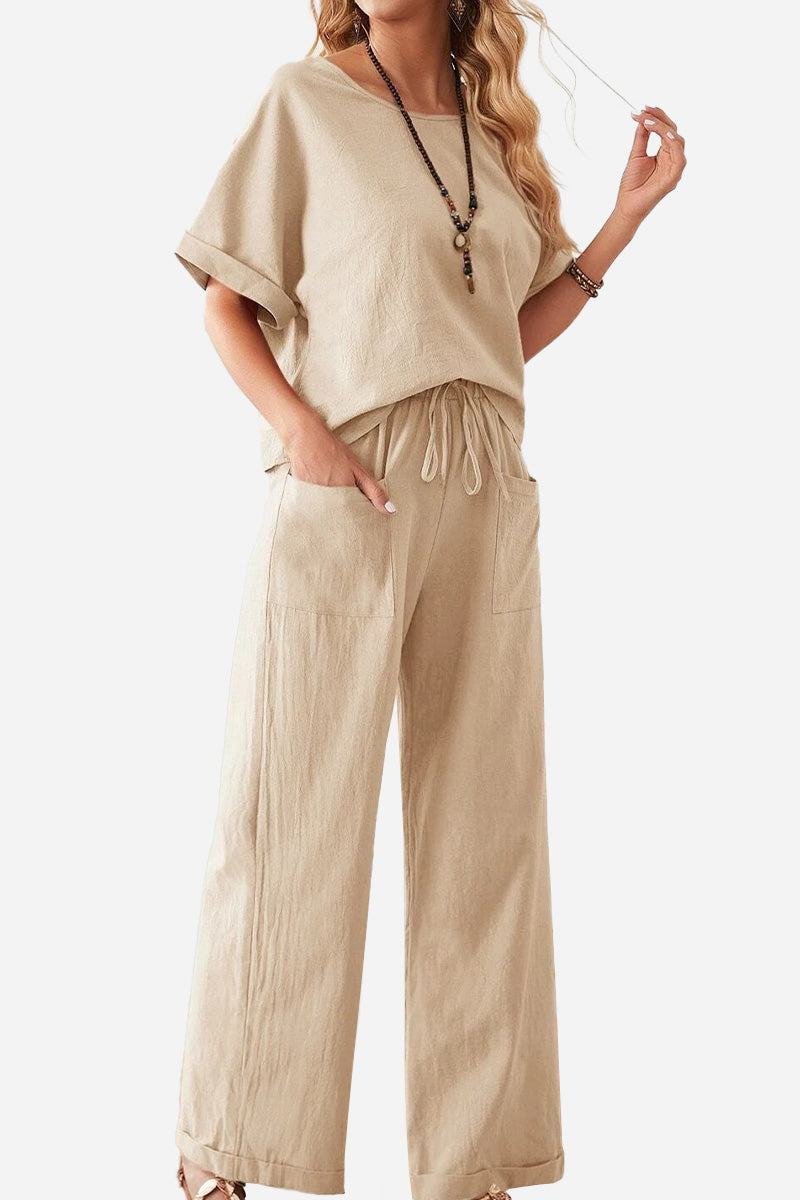 Woman wearing beige rolled cuff top and patch pocket pants set, casual relaxed fit outfit