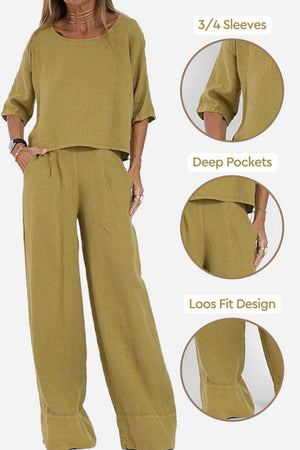 Mustard yellow short-sleeved pullover and wide trouser matching set with 3/4 sleeves, deep pockets, and loose fit design in breathable cotton fabric