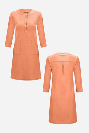 Lightweight orange cotton dress with 3/4 sleeves, button front, and pockets, front and back views.