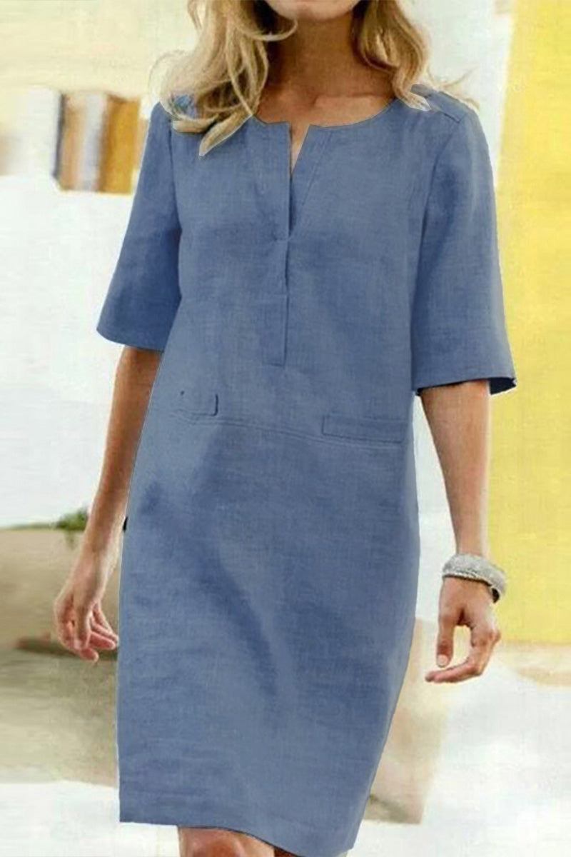 Blue cotton dress with 3/4 sleeves and simple collar detail, lightweight and casual knee-length design.