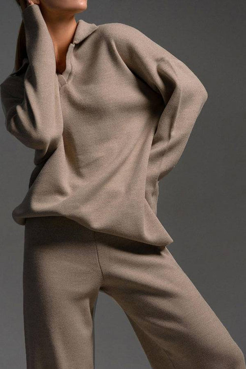 woman wearing plush and preppy camel two-piece knit set with polo collar and wide-leg pants