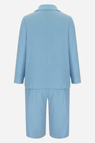 Light blue blazer and high-waisted shorts two-piece set back view