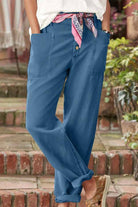 Blue casual button-down utility-chic trousers with pockets and rolled cuffs