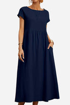 Navy blue capped-sleeve voluminous pleated midi dress with pockets and flattering waist drape