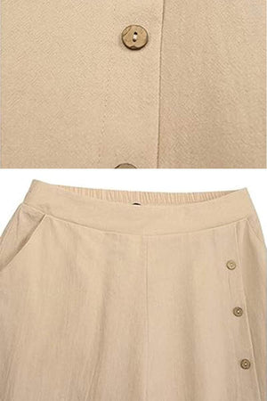 Beige wide leg pants with elastic narrow waist and side button detailing