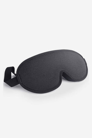 Black travel eye mask from Travel Comfy Kit for blocking light and enhancing rest during travel