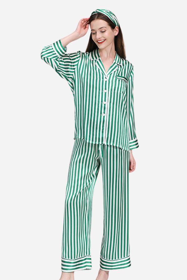 Woman wearing green and white striped 100% mulberry silk long sleeve pajama set with matching pants and headband
