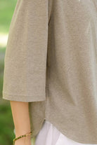 Close-up of beige Linen Cotton Classy eco-friendly shirt sleeve with casual loose fit