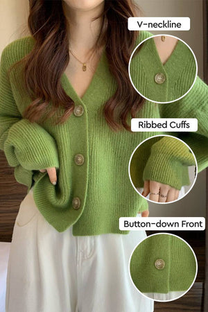Green casual loose boxy cardigan with V-neckline, ribbed cuffs, and button-down front in soft knit fabric