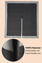 Elegant knitted poncho in two-tone gray polyester with lasting shape and travel-friendly care