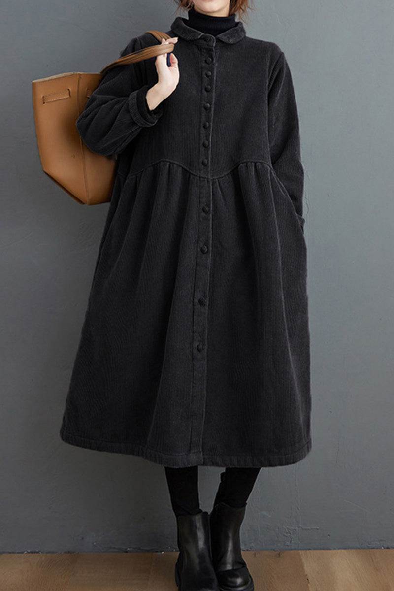 Black oversized vintage corduroy coat with button front, long sleeves, and gathered waist detail.