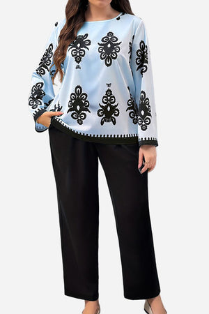 Plus Size Easy Elegance set featuring a light blue long-sleeve top with black intricate prints and black wide-leg pants, designed for comfort and style in plus sizes XL to 4XL.