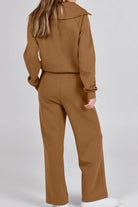 Back view of woman wearing brown Loungewear Buttersoft Tracksuit Set with oversized, cozy fit and wide-leg pants.