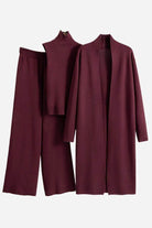 Burgundy three-piece collection set with cardigan, sleeveless top, and wide-leg pants in soft viscose blend fabric