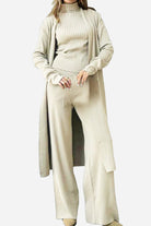 Beige one-size-fits-all luxurious three-piece collection with cardigan, ribbed turtleneck, and wide-leg pants