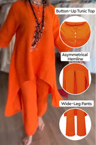 Breathable & featherlight vibrant orange lounge set with button-up tunic, asymmetrical hemline, and wide-leg pants