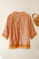 Sheer embroidered cotton linen Tuscany top with layered hem and buttons in soft peach tone